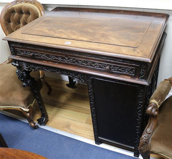 A Chinese export desk (lacking drawers) W.92cm.